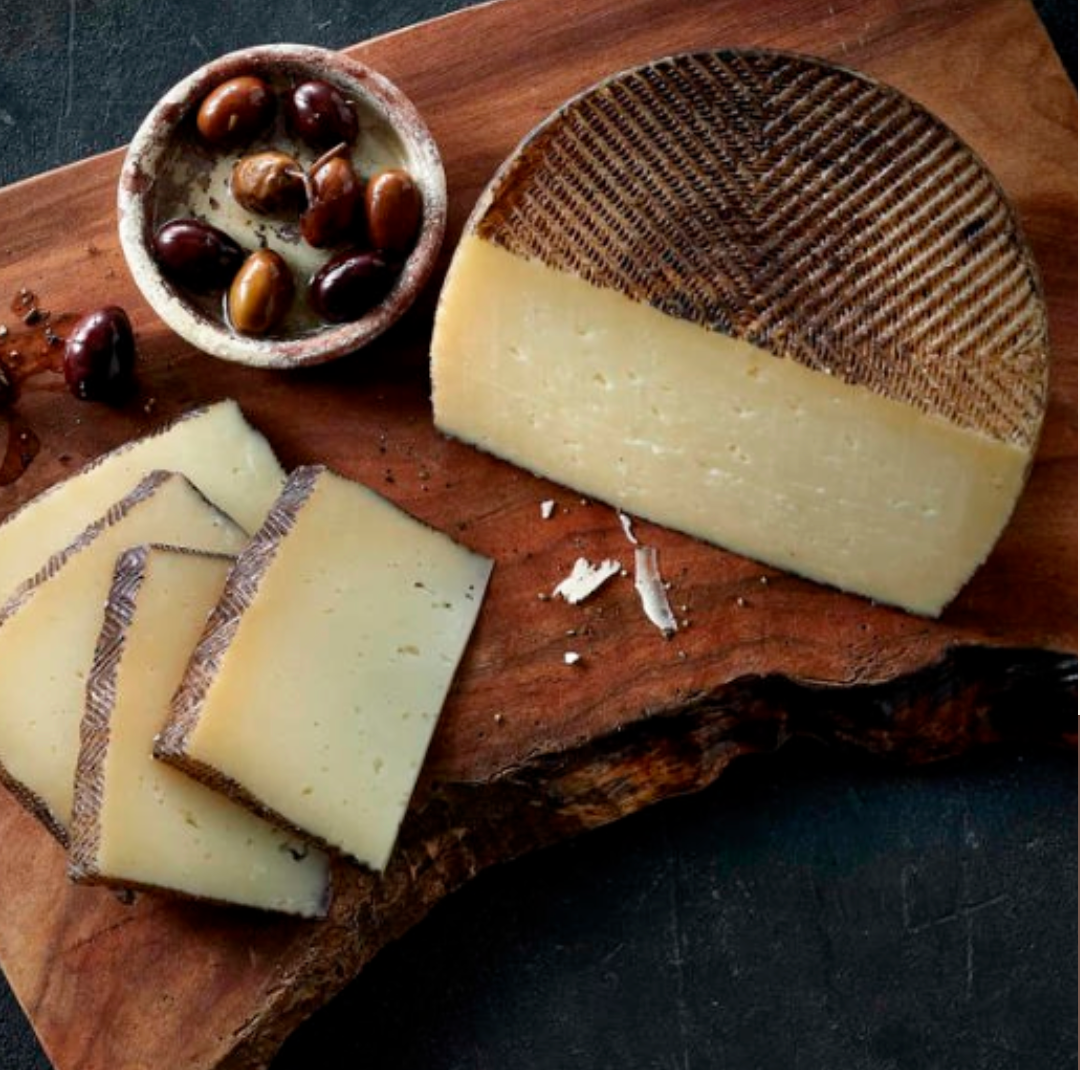 Aged Manchego: The Star of Your February Cheeseboard + Perfect Pairings