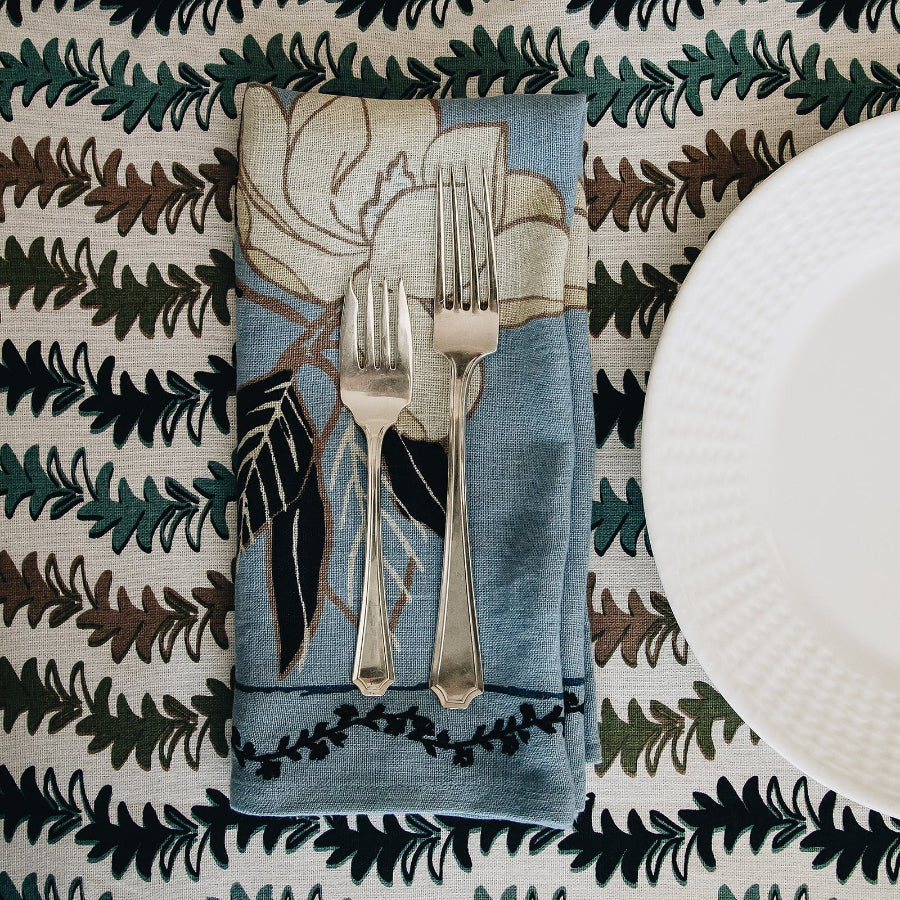 blue napkin with floral design