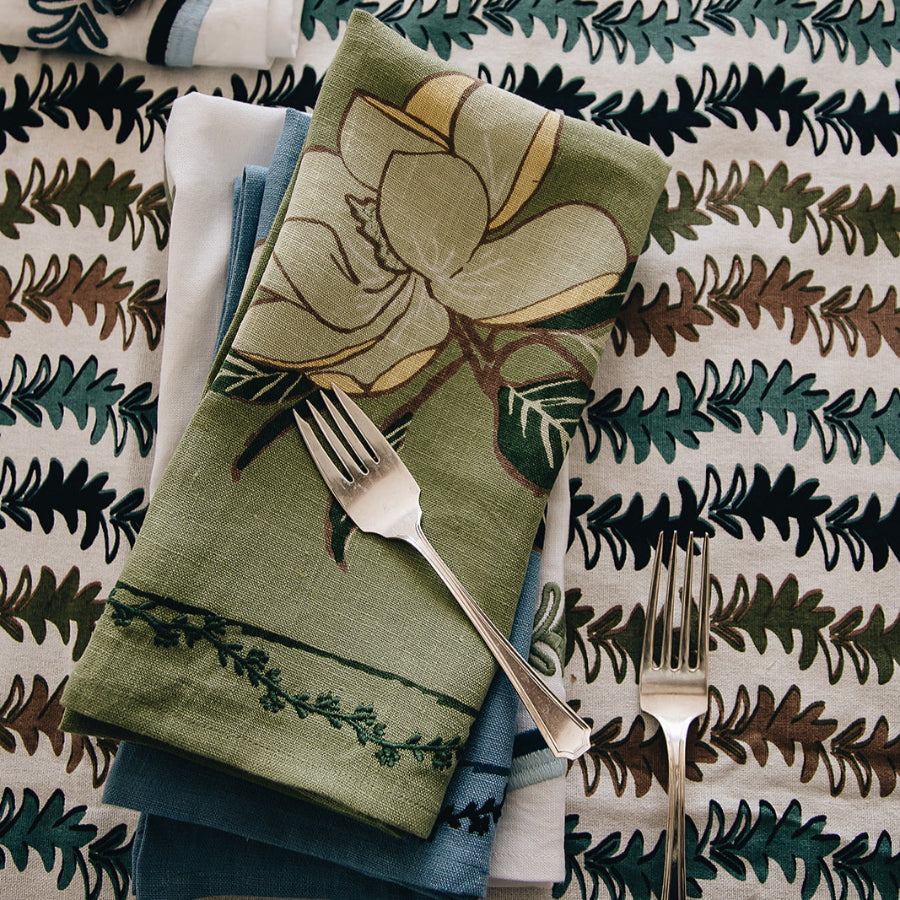 green napkin with floral design