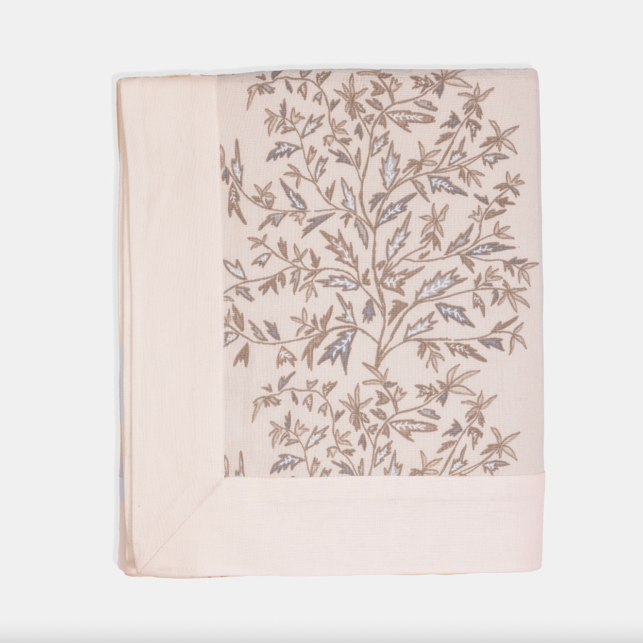 cream tablecloth with floral detailing