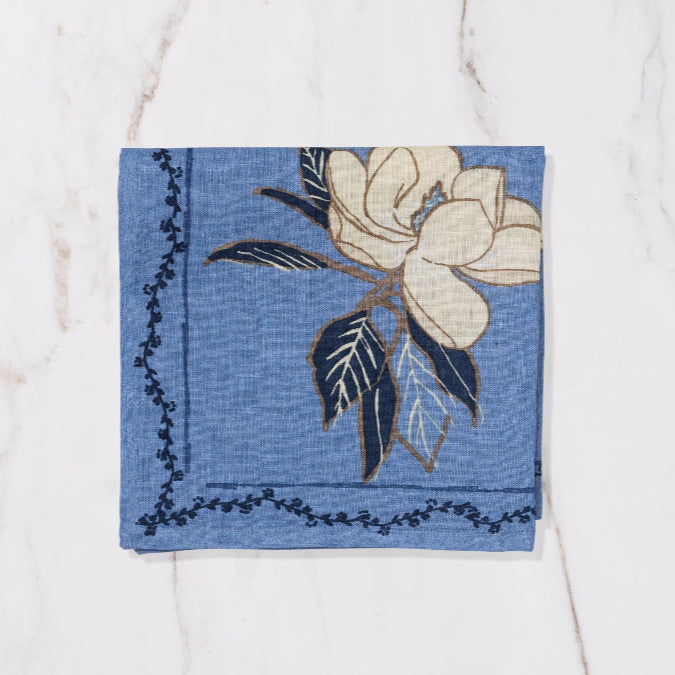 blue napkin with floral design
