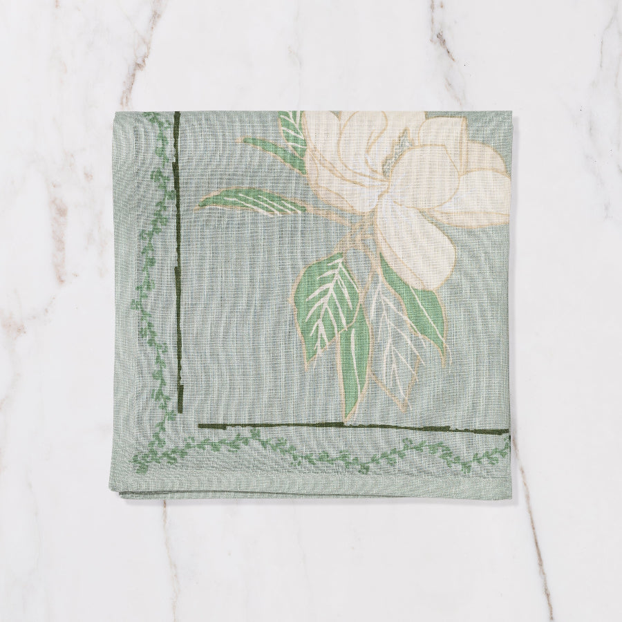 blueish grey napkin with floral design