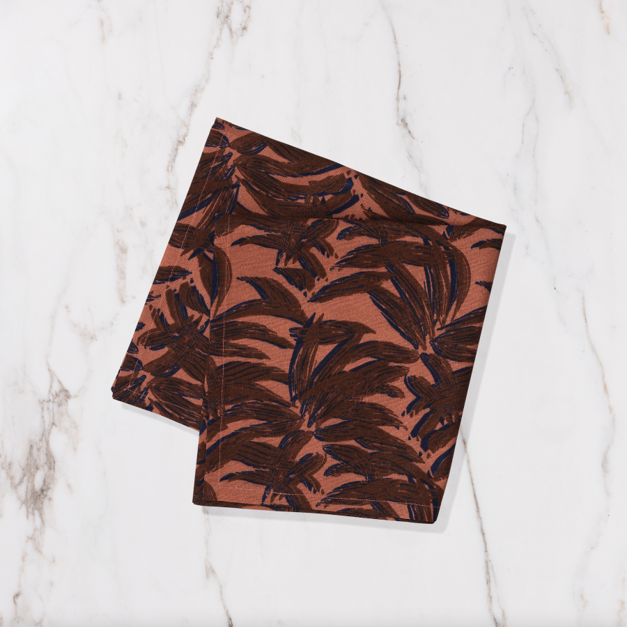 orange napkin with brown detailing