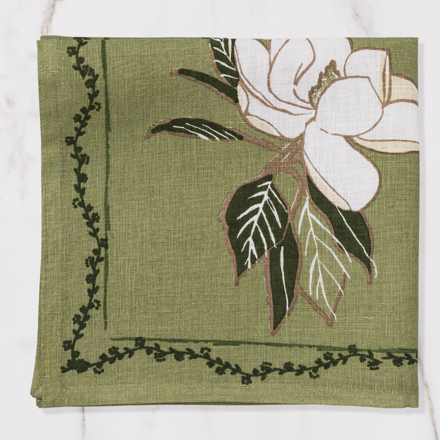 green napkin with floral design