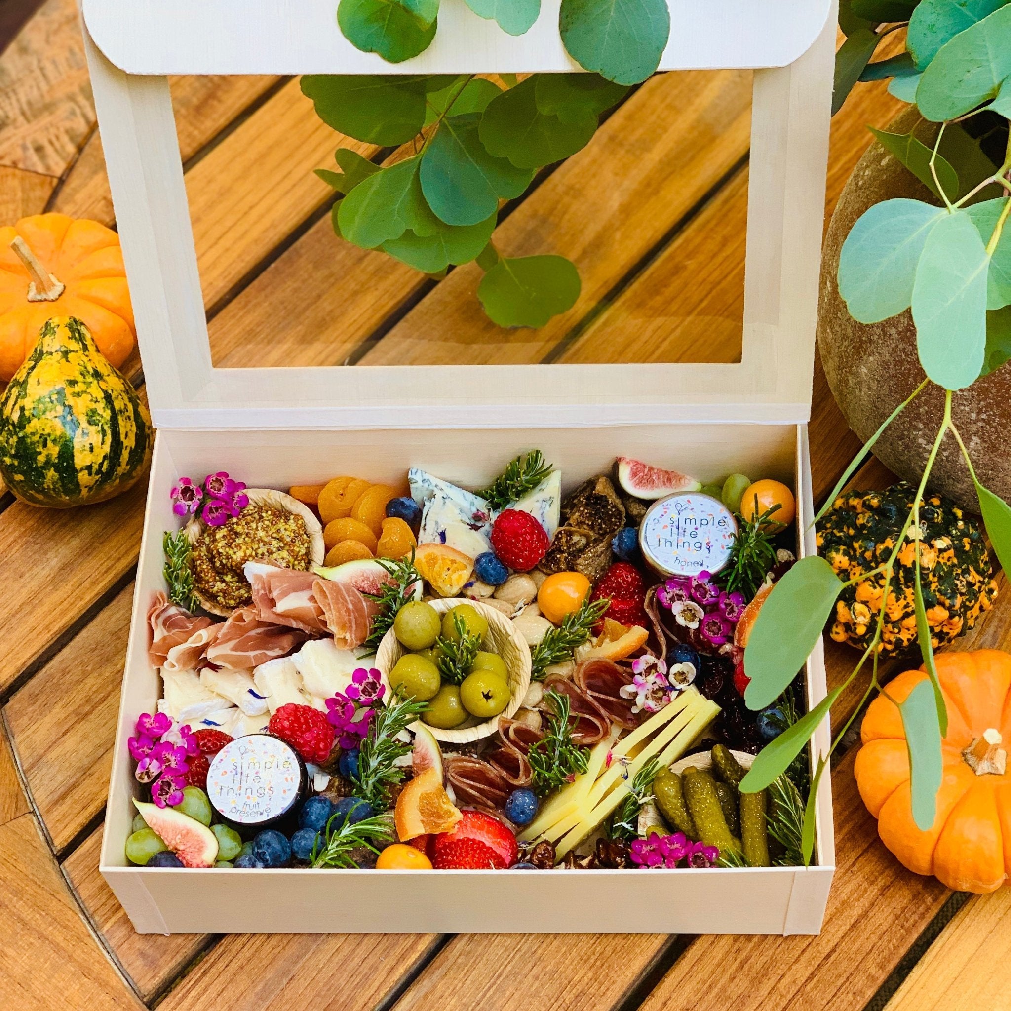 cheese gift box with pumpkin display and eucalyptus